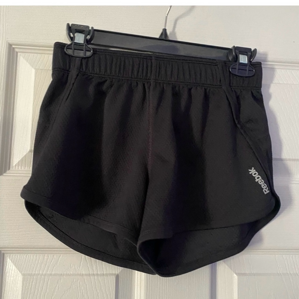 Reebok Women's Black Athletic Shorts are a size XS.